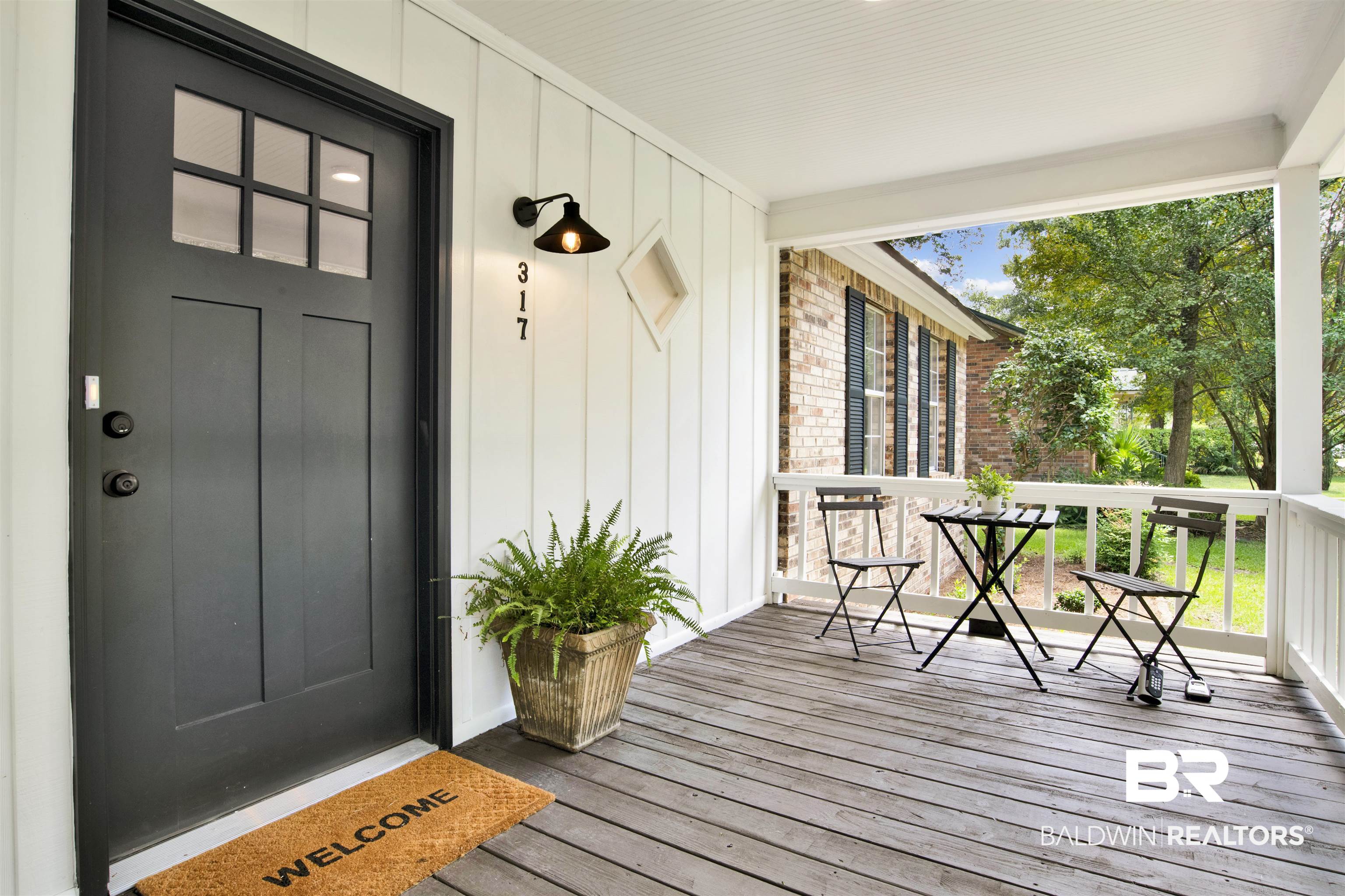 317 Lee Street Chickasaw, AL 36611 - Photo 2 of 40 Property entrance with a porch and brick siding