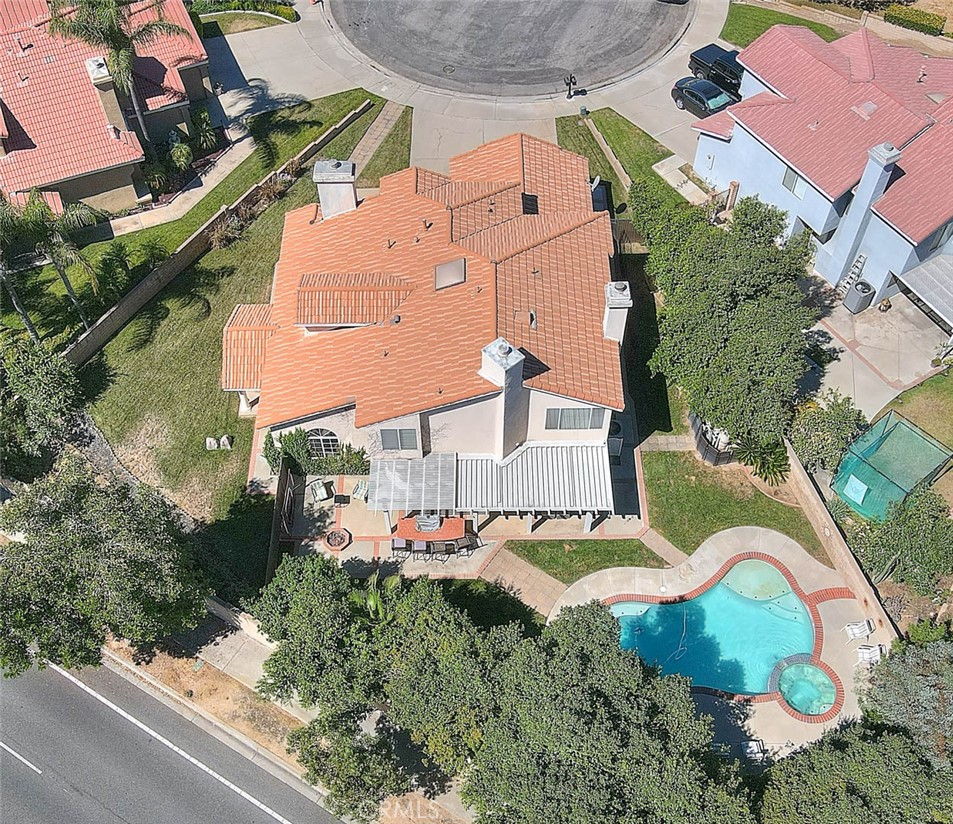 28832 Harwick Drive Highland, CA 92346 - Photo 11 of 62 an aerial view of a house with a yard and potted plants