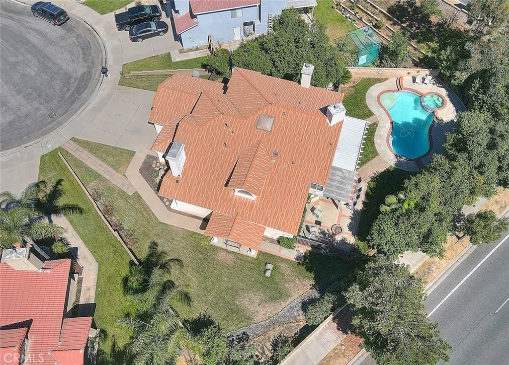 28832 Harwick Drive Highland, CA 92346 - Photo 12 of 62 an aerial view of a house with outdoor space and a swimming pool