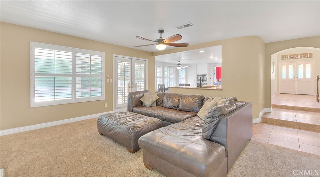 28832 Harwick Drive Highland, CA 92346 - Photo 15 of 62 a living room with furniture and a large window