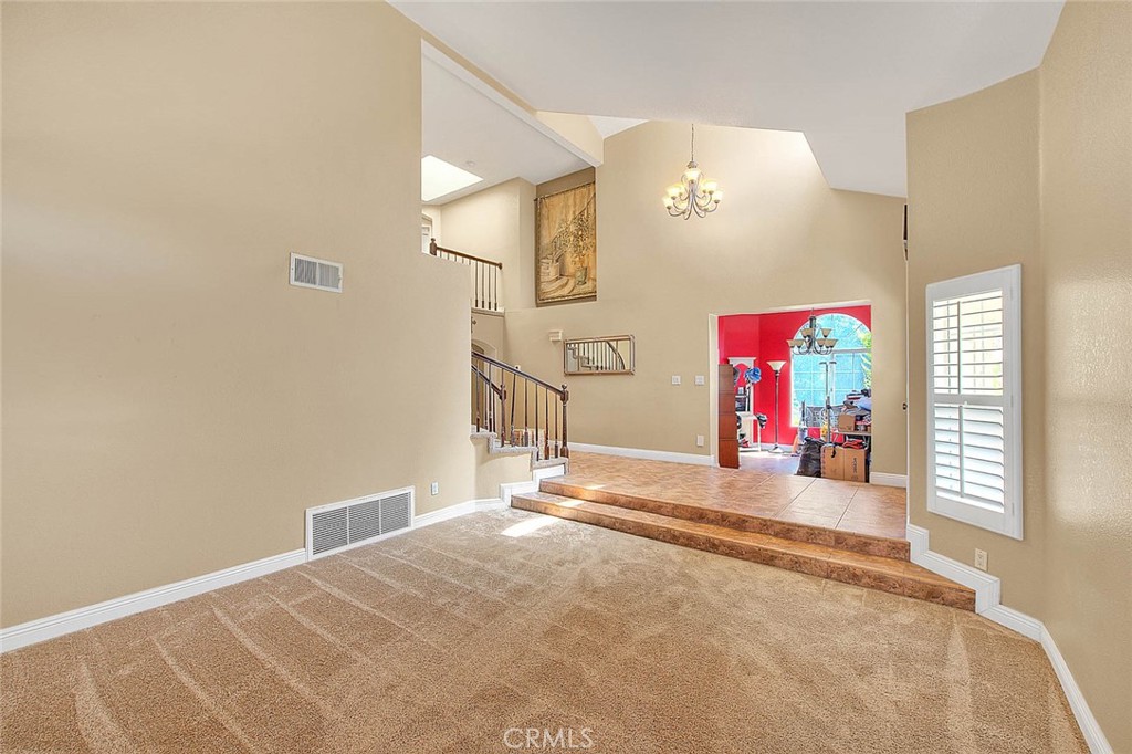 28832 Harwick Drive Highland, CA 92346 - Photo 19 of 62 a view of a livingroom with wooden floor and window