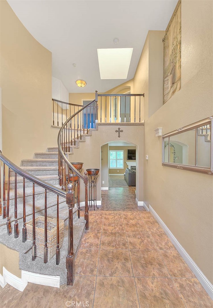 28832 Harwick Drive Highland, CA 92346 - Photo 35 of 62 a view of entryway and hall with wooden floor