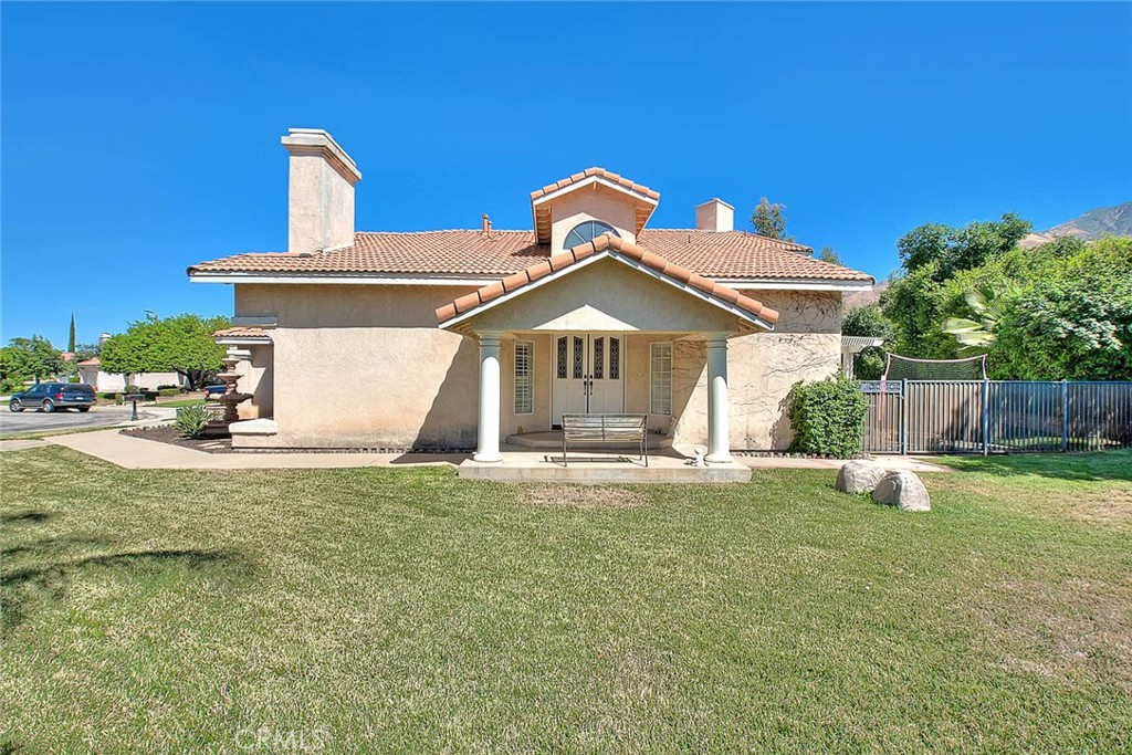 28832 Harwick Drive Highland, CA 92346 - Photo 4 of 62 a front view of a house with a yard