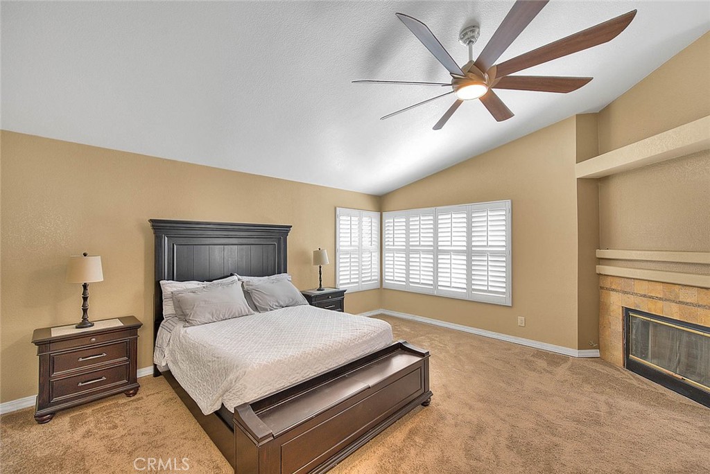28832 Harwick Drive Highland, CA 92346 - Photo 51 of 62 a bedroom with a bed and a ceiling fan