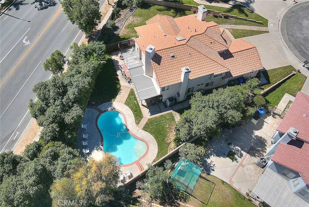 28832 Harwick Drive Highland, CA 92346 - Photo 55 of 62 an aerial view of a house with outdoor space and a garden