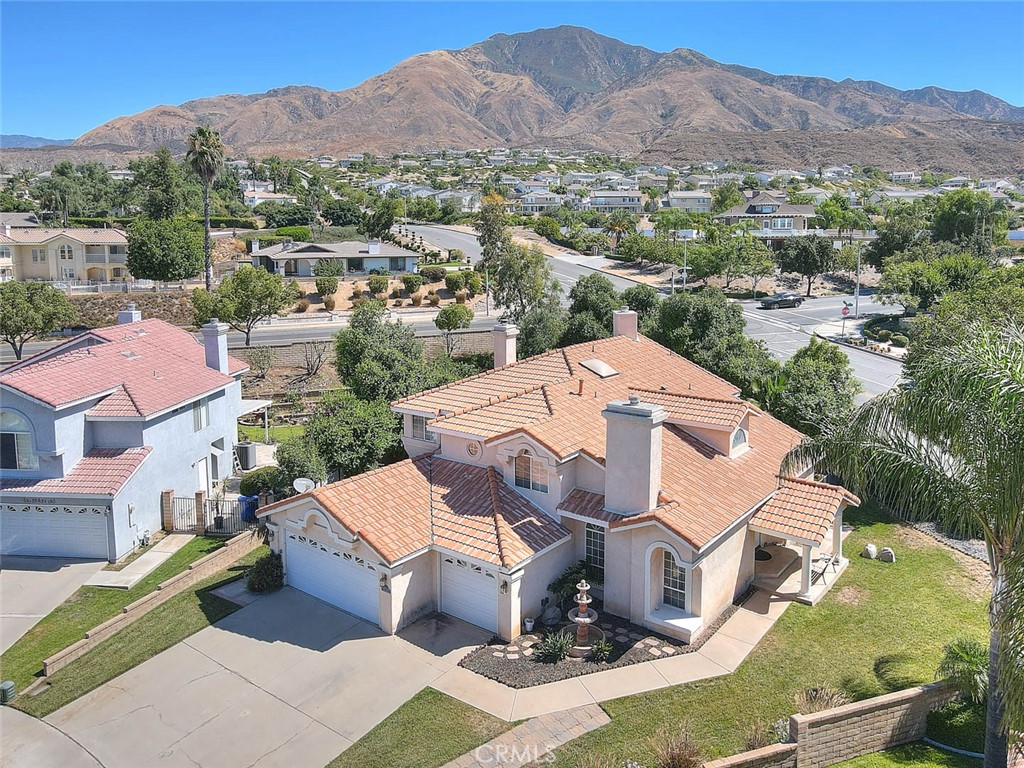 28832 Harwick Drive Highland, CA 92346 - Photo 8 of 62 an aerial view of a house with a mountain view