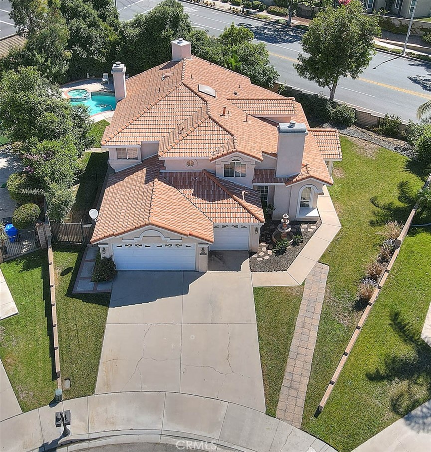 28832 Harwick Drive Highland, CA 92346 - Photo 10 of 62 an aerial view of a house with outdoor space and a lake view