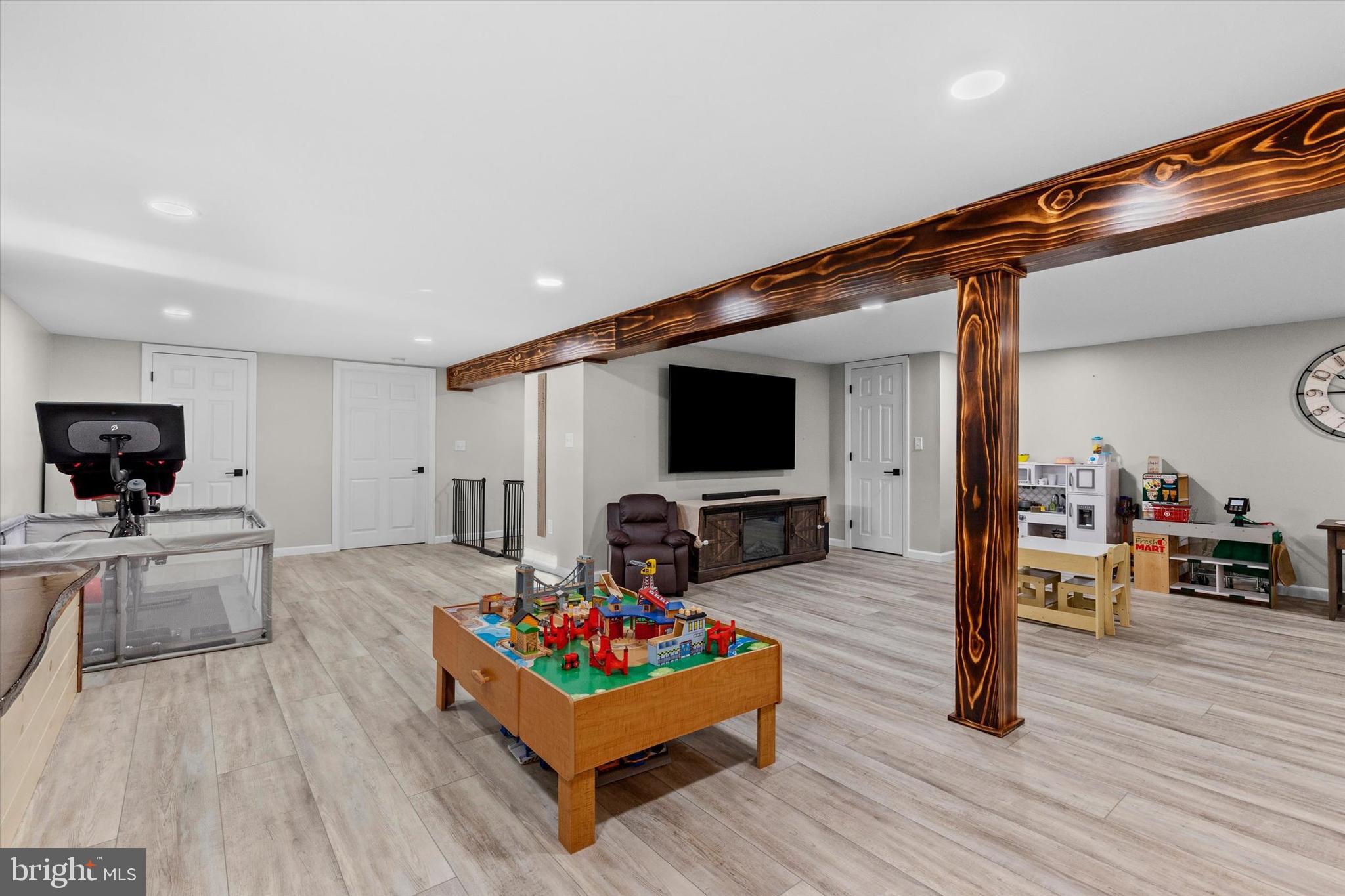 239 Mill Road Mount Joy, PA 17552 - Photo 24 of 42 a living room with furniture and a flat screen tv