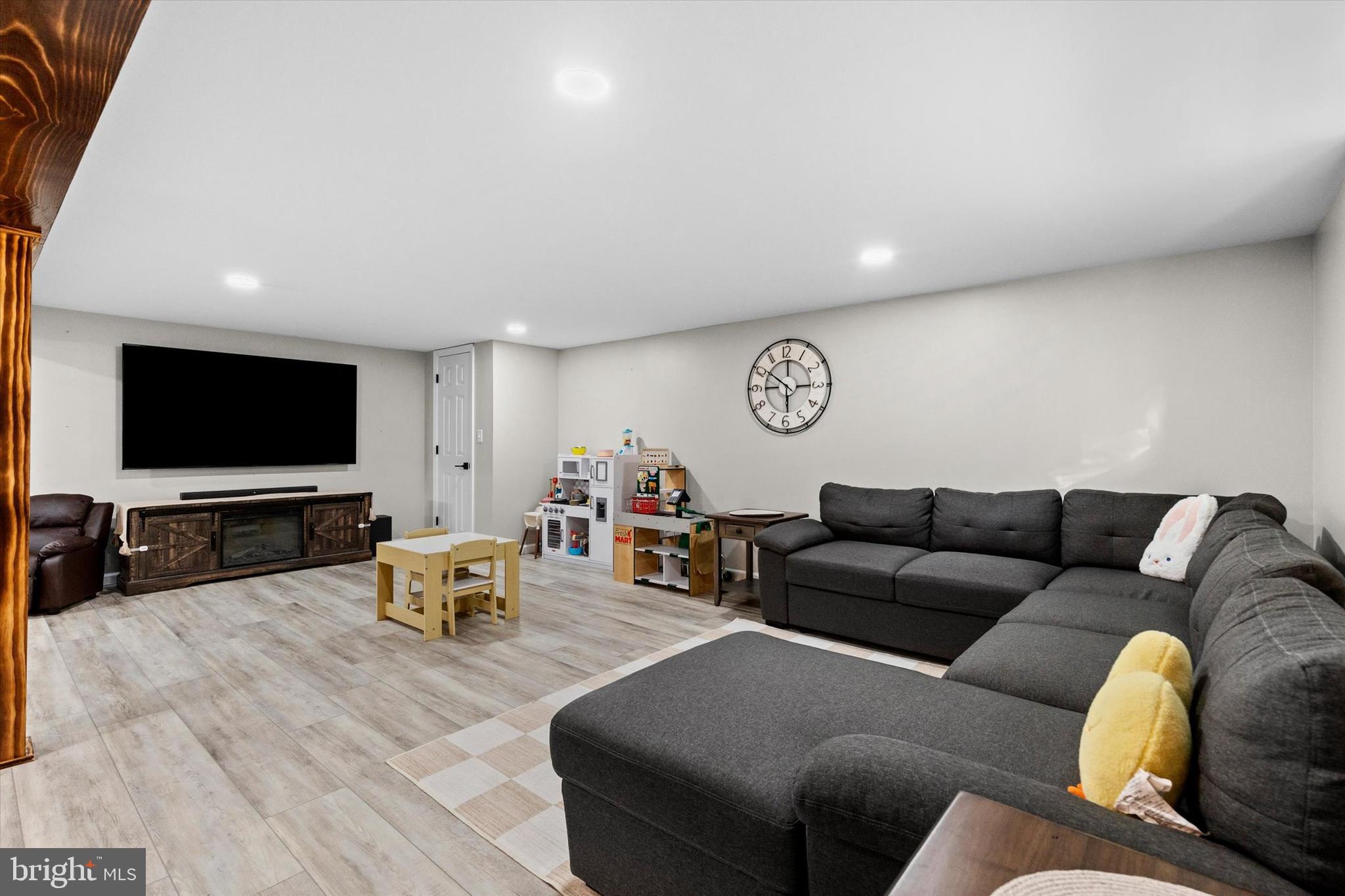 239 Mill Road Mount Joy, PA 17552 - Photo 25 of 42 a living room with furniture and a flat screen tv