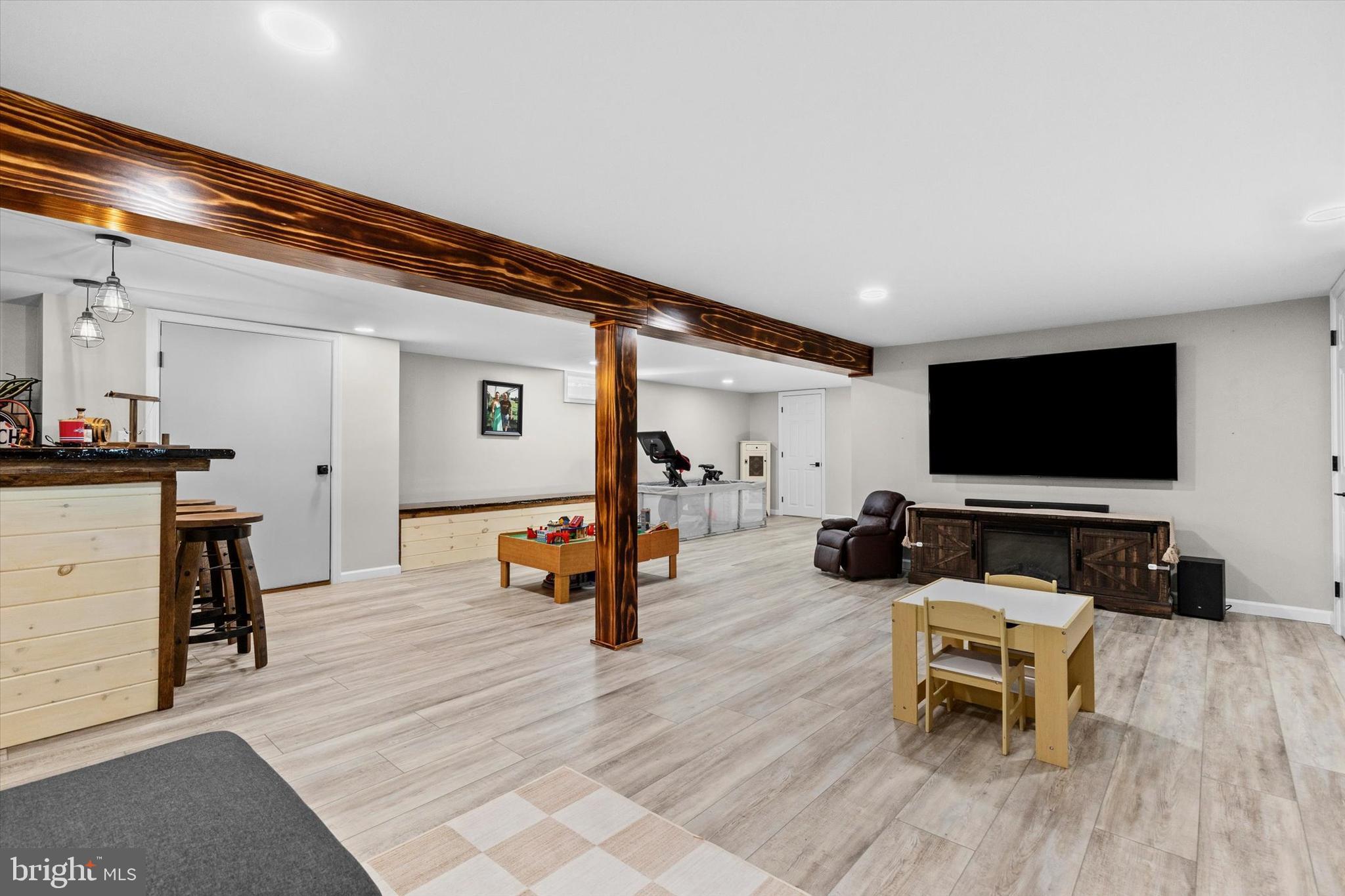 239 Mill Road Mount Joy, PA 17552 - Photo 26 of 42 a living room with furniture and a flat screen tv