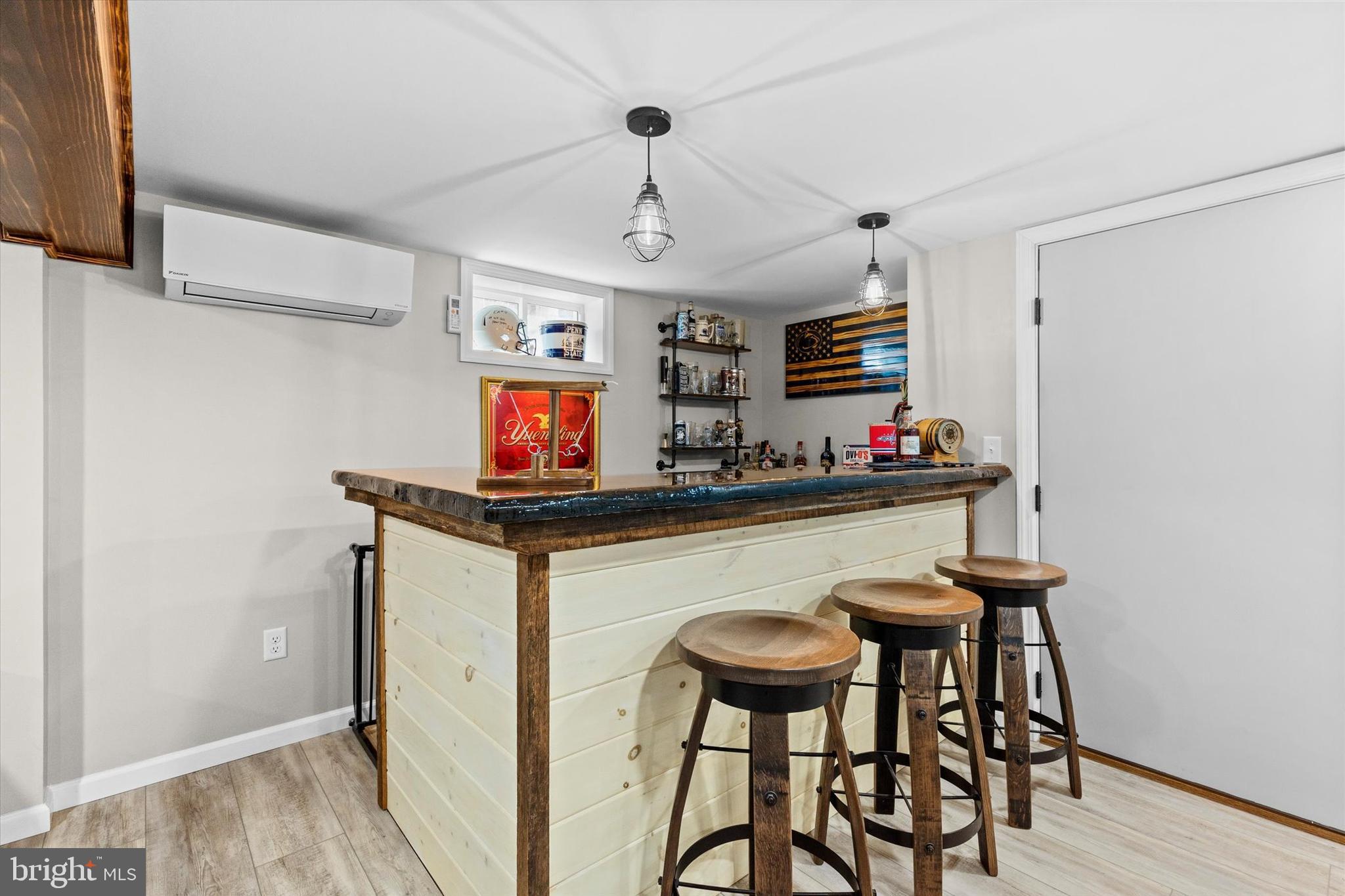 239 Mill Road Mount Joy, PA 17552 - Photo 27 of 42 a kitchen with stainless steel appliances kitchen island granite countertop a table and chairs in it
