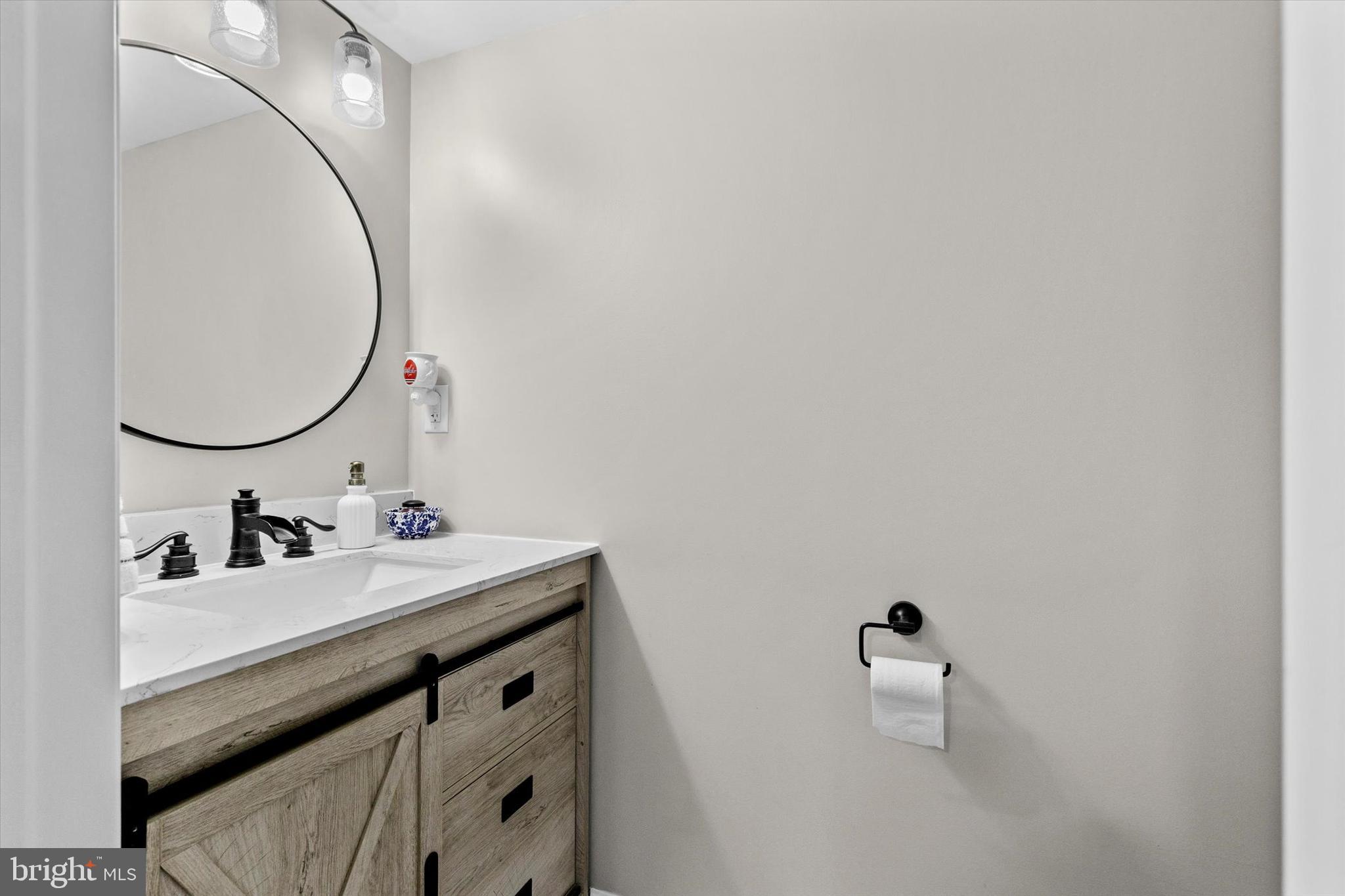 239 Mill Road Mount Joy, PA 17552 - Photo 29 of 42 a bathroom with a sink and a mirror