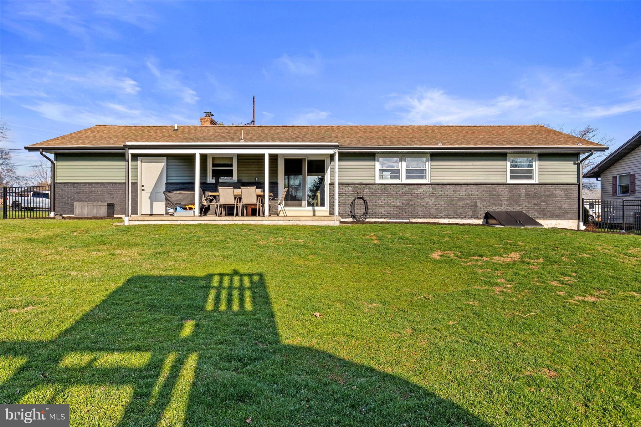 239 Mill Road Mount Joy, PA 17552 - Photo 32 of 42 a view of a house with a yard and sitting area