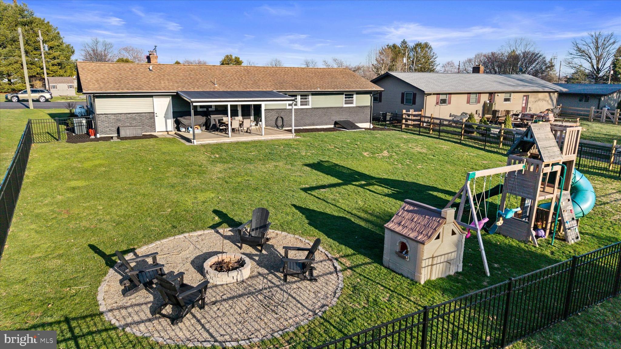 239 Mill Road Mount Joy, PA 17552 - Photo 37 of 42 a view of a house with backyard porch and sitting area