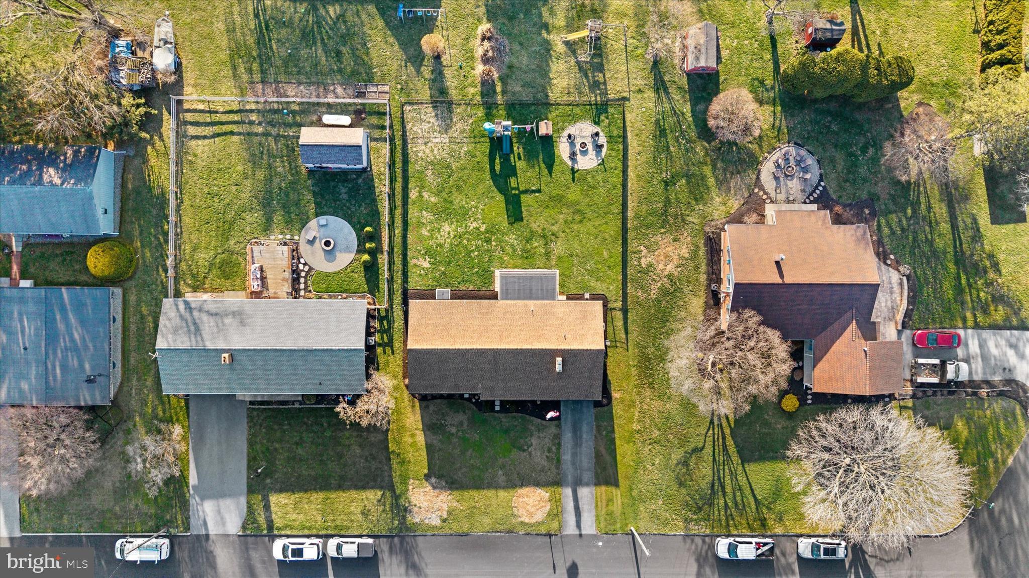 239 Mill Road Mount Joy, PA 17552 - Photo 39 of 42 an aerial view of a house with swimming pool and outdoor space
