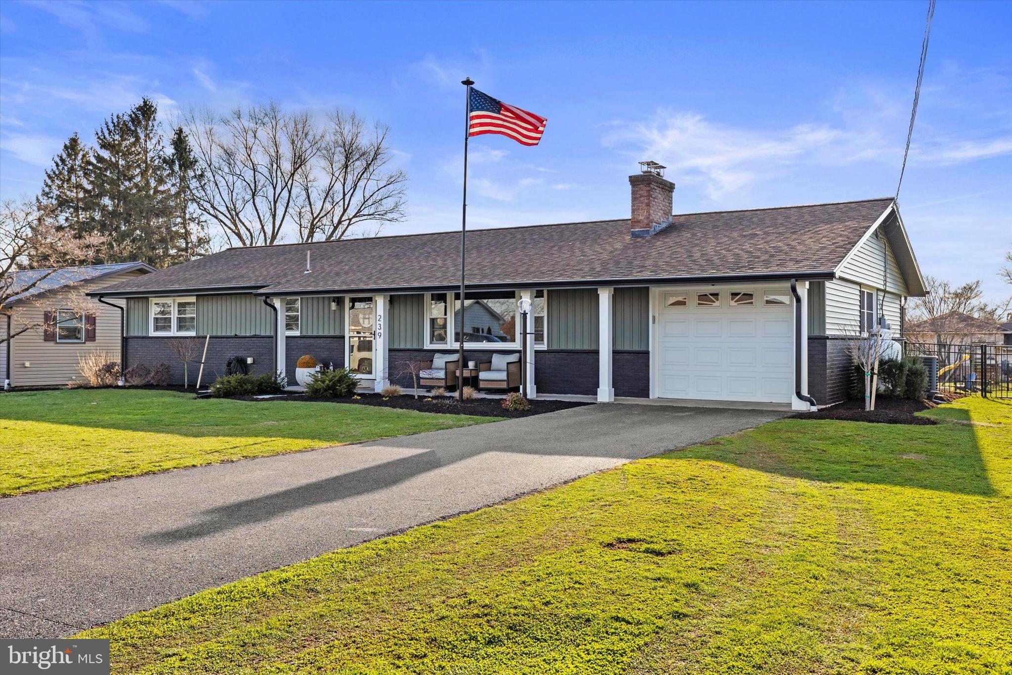239 Mill Road Mount Joy, PA 17552 - Photo 4 of 42 a view of a house with a yard and swimming pool