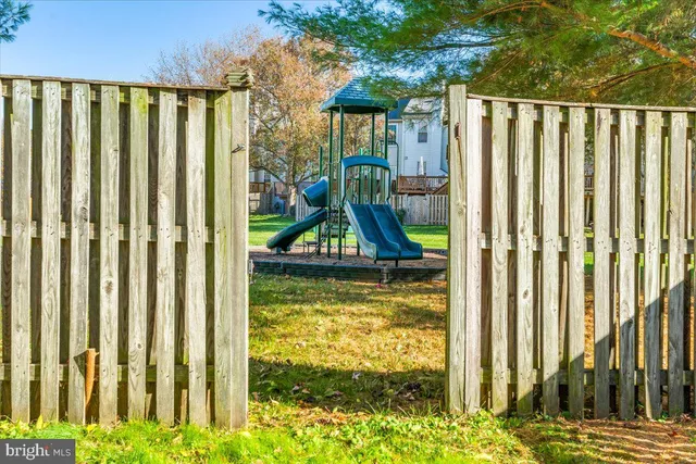a view of swimming pool with furniture