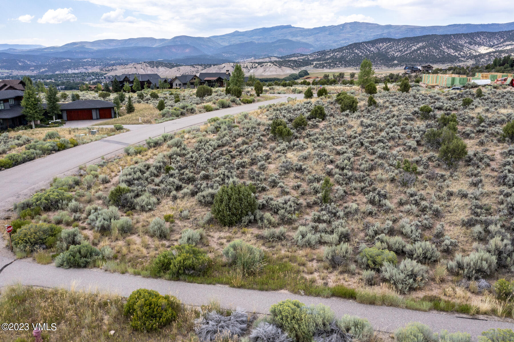 47 Aster Court Eagle, CO 81631 - Photo 3 of 17 a view of a lush green hillside and houses