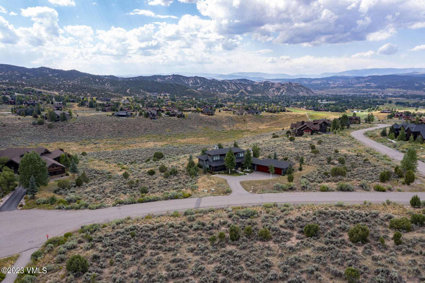 47 Aster Court Eagle, CO 81631 - Photo 4 of 17 a view of a lake with mountains in the background