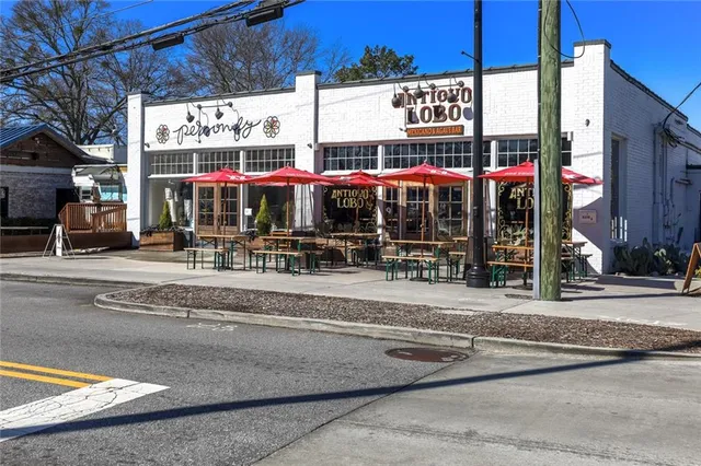 a view of street with shops
