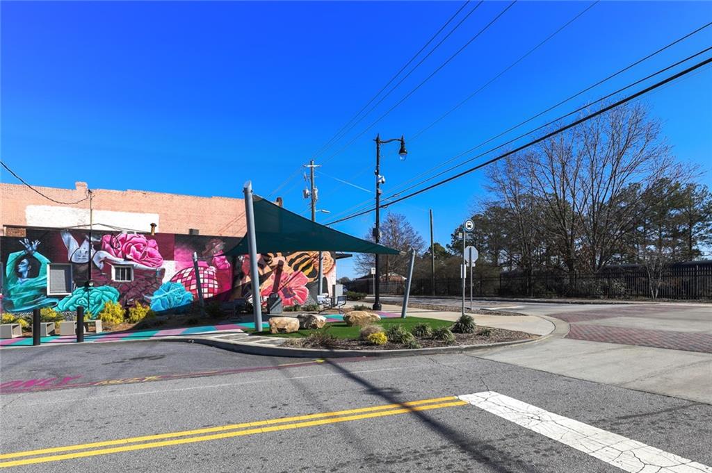 5434 Peachtree Road, Unit 109 Atlanta, GA 30341 - Photo 25 of 32 a view of street with shops