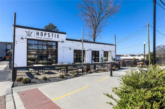 a view of a building with a yard