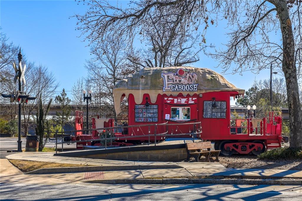 5434 Peachtree Road, Unit 109 Atlanta, GA 30341 - Photo 27 of 32 a view of a building with a yard