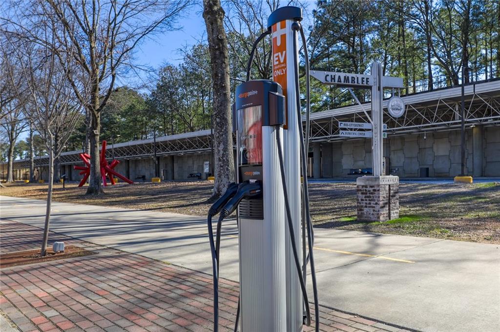 5434 Peachtree Road, Unit 109 Atlanta, GA 30341 - Photo 29 of 32 a view of a park with swings and slides