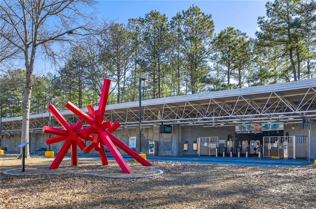 5434 Peachtree Road, Unit 109 Atlanta, GA 30341 - Photo 30 of 32 a view of a house with a yard