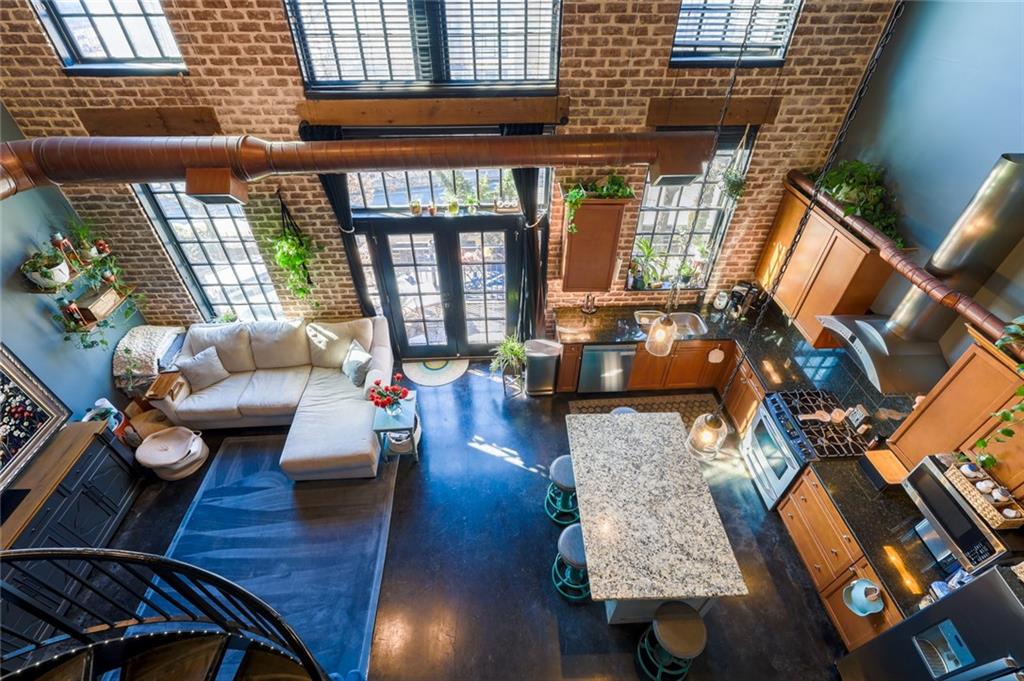 5434 Peachtree Road, Unit 109 Atlanta, GA 30341 - Photo 7 of 32 a living room with furniture and a window