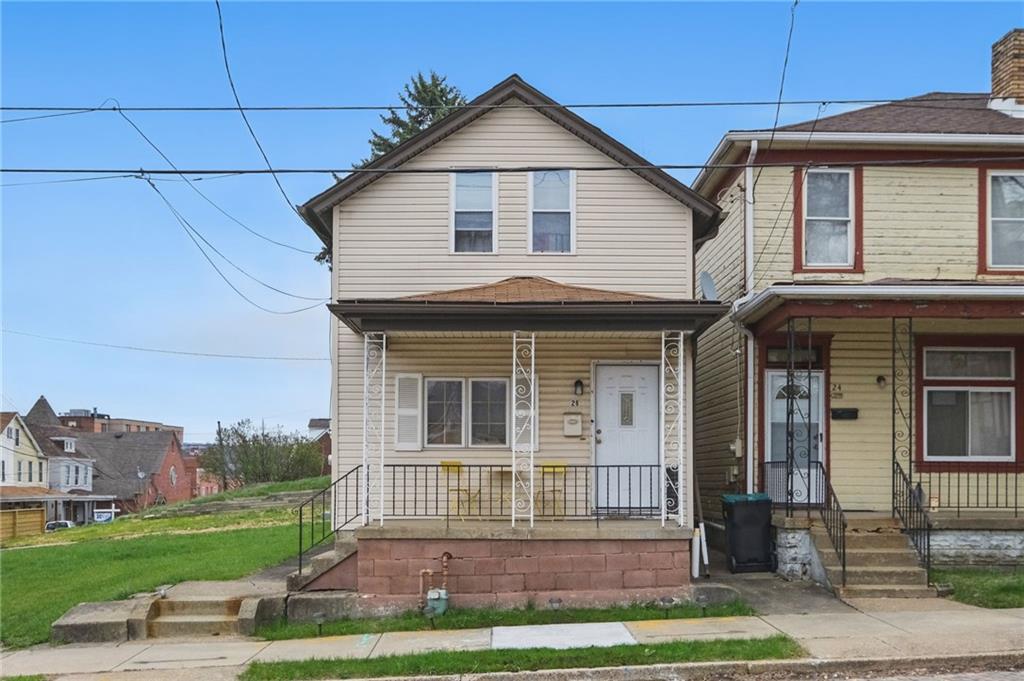 26 May Avenue McKees Rocks, PA 15136 - Photo 27 of 28 a front view of a house with a yard