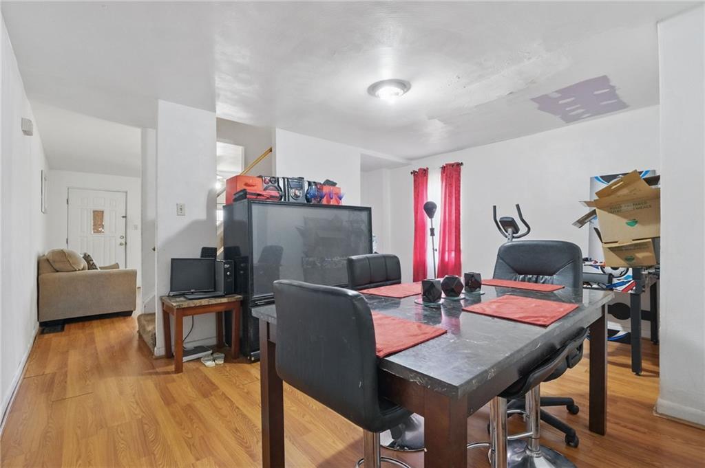 26 May Avenue McKees Rocks, PA 15136 - Photo 9 of 28 a view of a dining room with furniture and wooden floor
