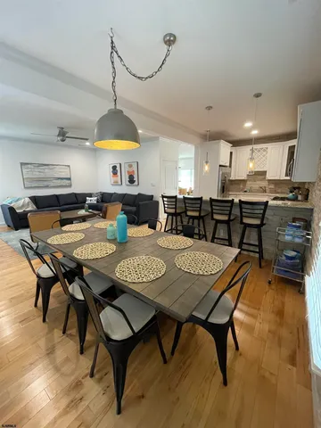 a view of a dining room with furniture