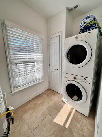 a view of entryway with washer and dryer