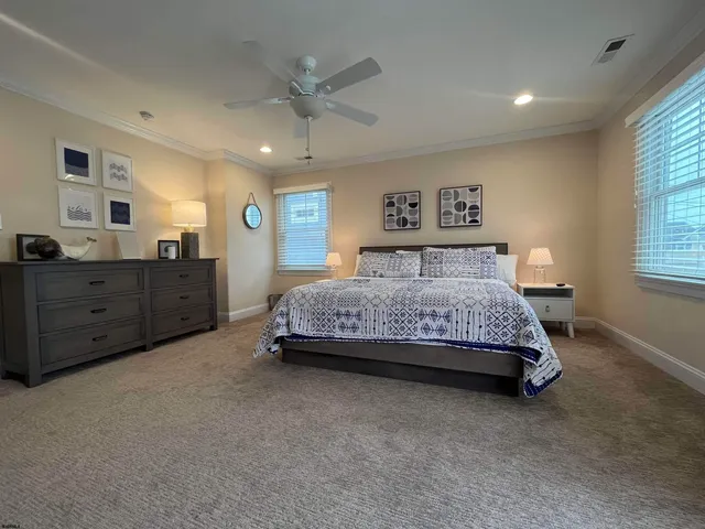 a bedroom with a bed and a cabinets