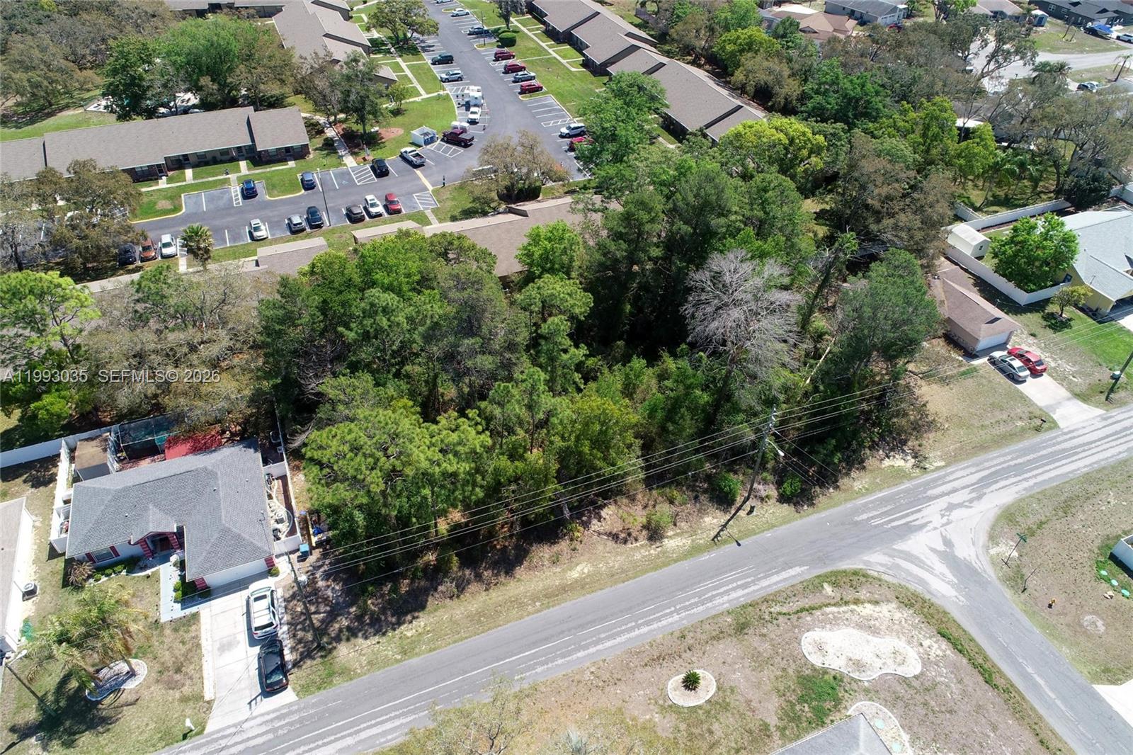 1 Tomahawk Avenue Spring Hill, FL 34606 - Photo 11 of 20 an aerial view of house with yard