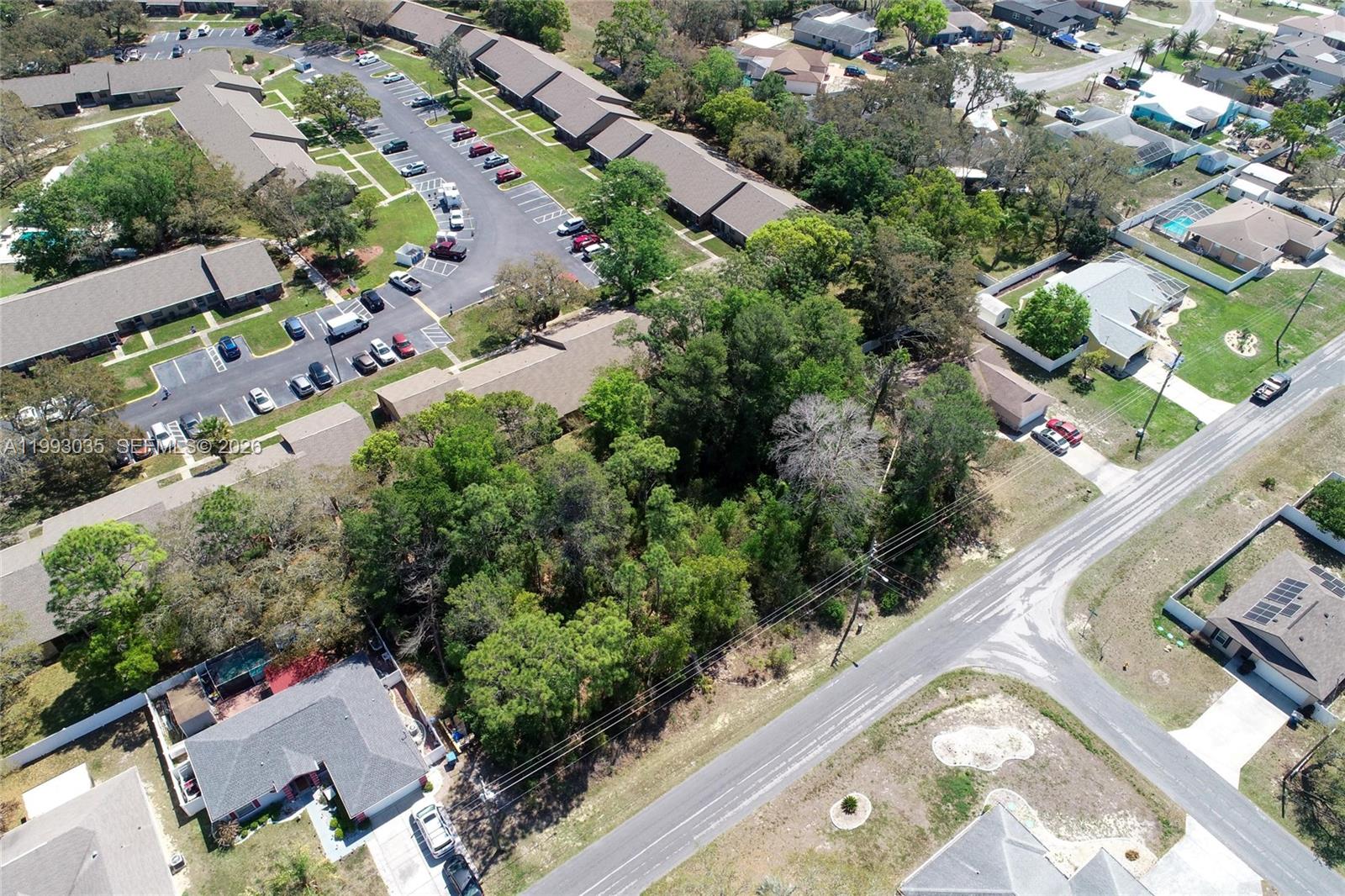 1 Tomahawk Avenue Spring Hill, FL 34606 - Photo 14 of 20 an aerial view of a city