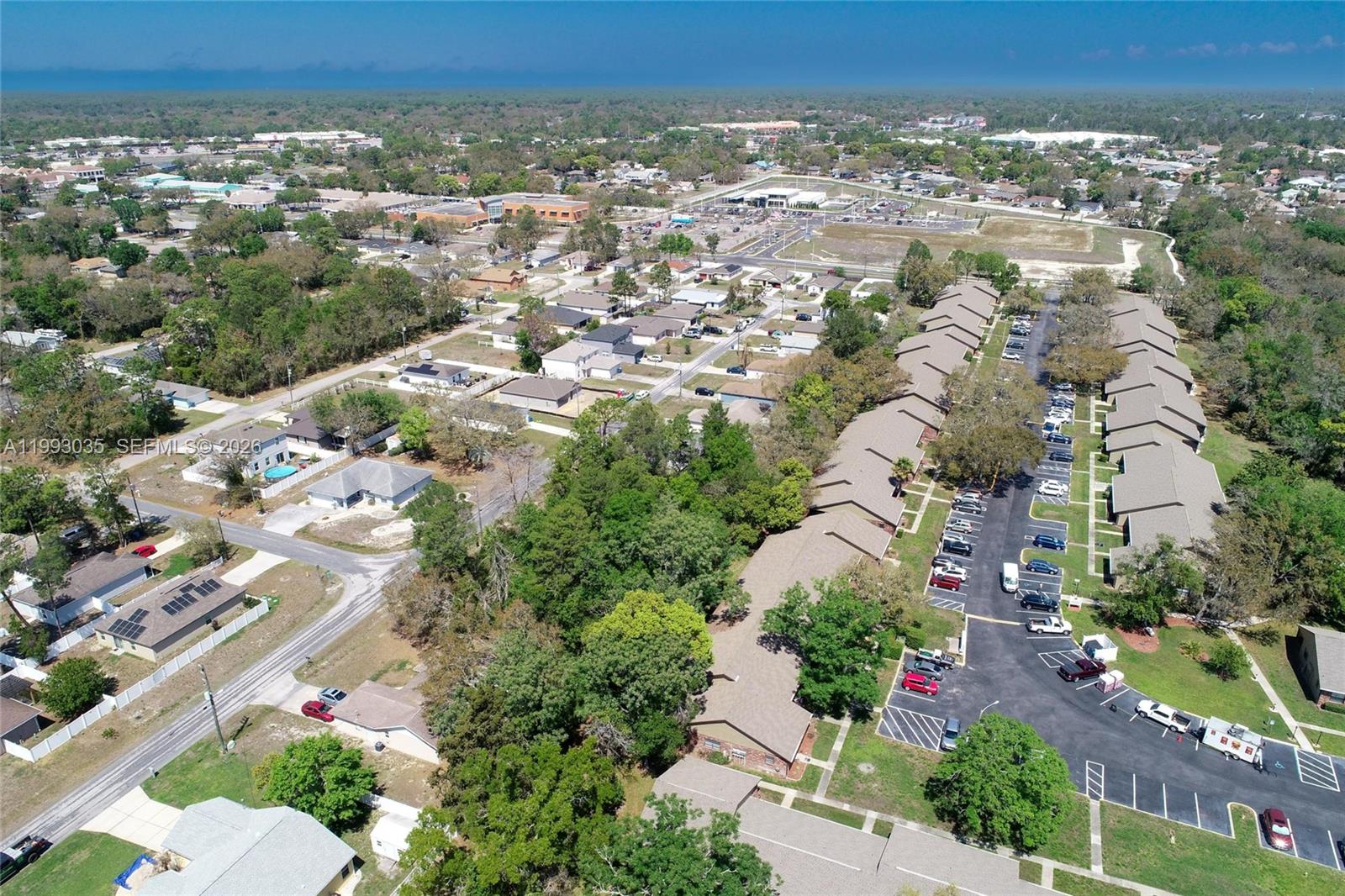 1 Tomahawk Avenue Spring Hill, FL 34606 - Photo 19 of 20 an aerial view of residential houses with outdoor space