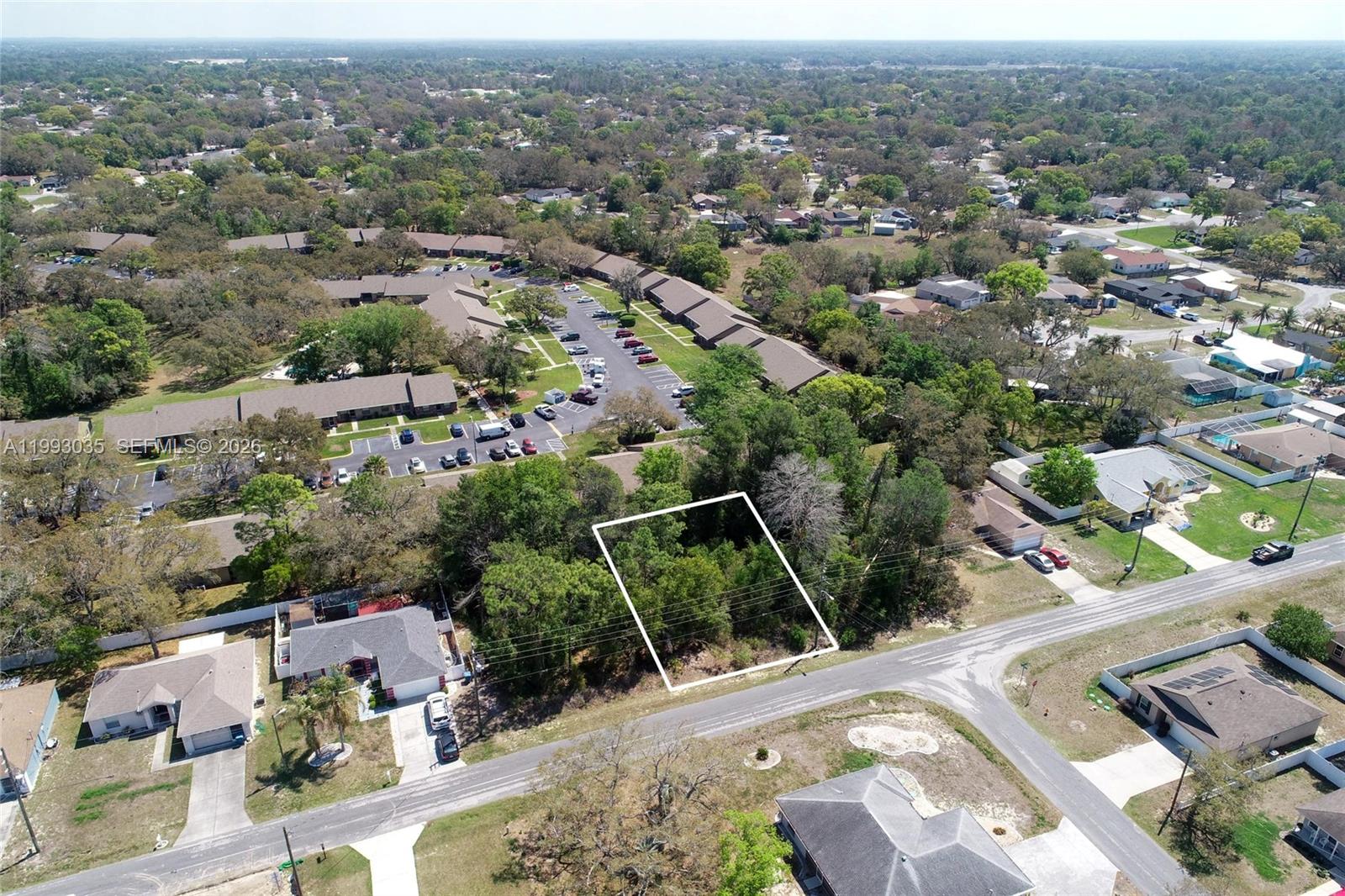 1 Tomahawk Avenue Spring Hill, FL 34606 - Photo 2 of 20 an aerial view of multiple house
