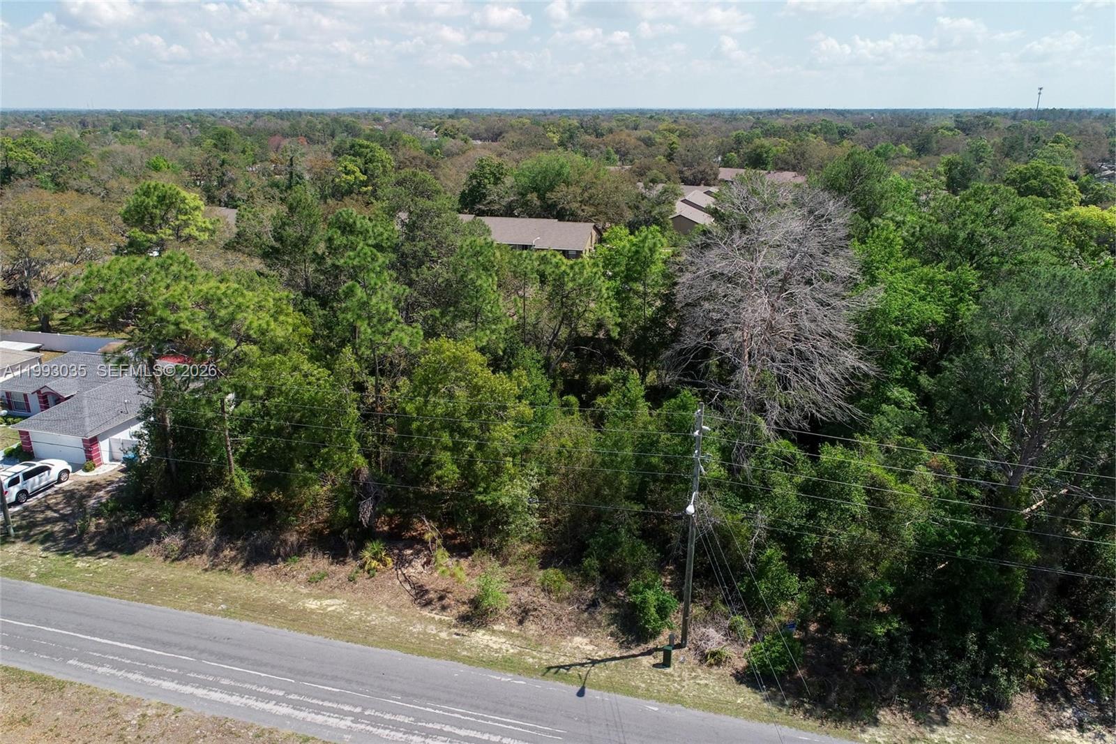 1 Tomahawk Avenue Spring Hill, FL 34606 - Photo 6 of 20 an aerial view of multiple house