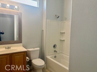 10495 Bridge Haven Road Apple Valley, CA 92308 - Photo 14 of 19 a bathroom with a sink a toilet and shower