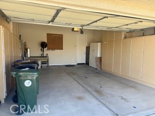 10495 Bridge Haven Road Apple Valley, CA 92308 - Photo 16 of 19 a living room with a couch and dresser