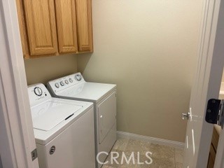 10495 Bridge Haven Road Apple Valley, CA 92308 - Photo 8 of 19 a utility room with dryer and washer