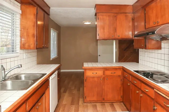 a backyard of a house with lots of green space