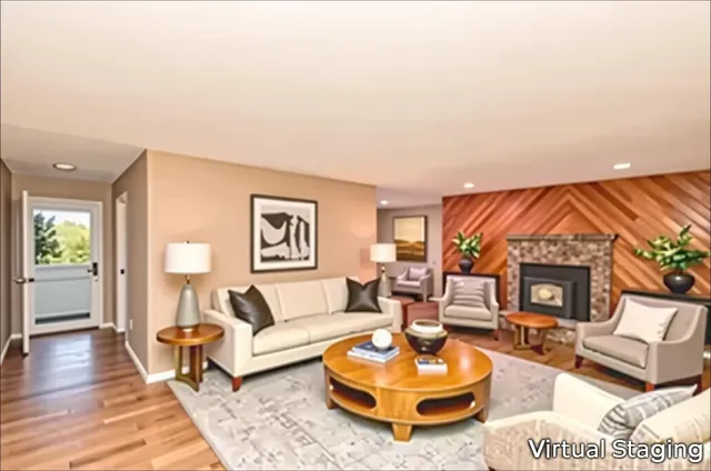 a dining room with furniture a chandelier and wooden floor