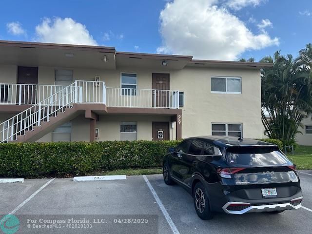 a car parked in front of a house