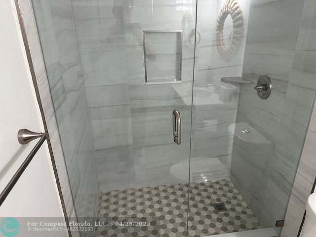 7605 Northwest 5th Court, Unit 208 Margate, FL 33063 - Photo 16 of 25 a bathroom with a shower
