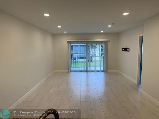 7605 Northwest 5th Court, Unit 208 Margate, FL 33063 - Photo 6 of 25 a view of livingroom with hardwood