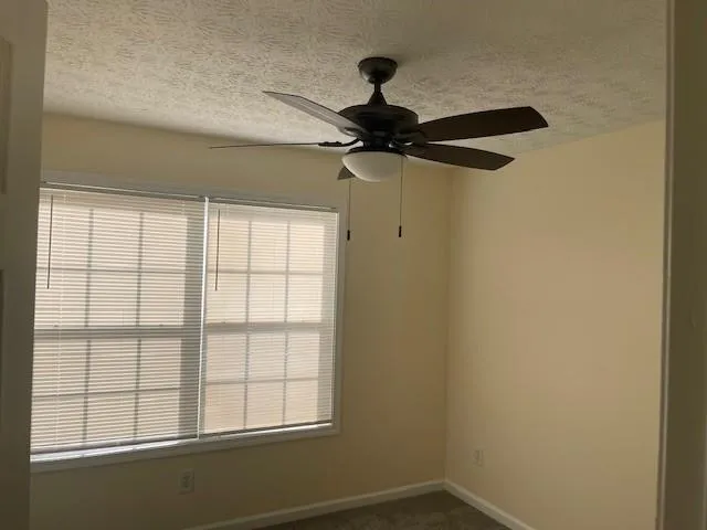 a view of a window in an empty room