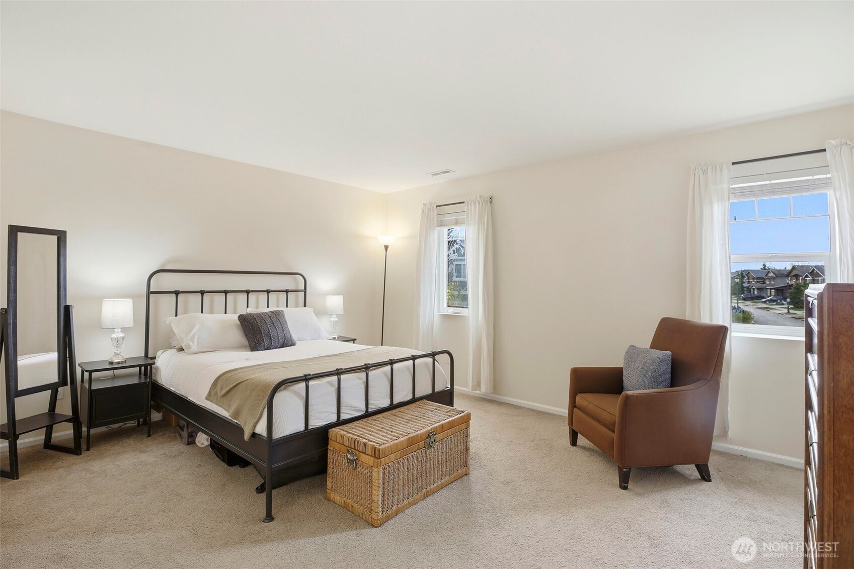 3662 London Loop Northeast Lacey, WA 98516 - Photo 21 of 40 a bedroom with bed and a couch